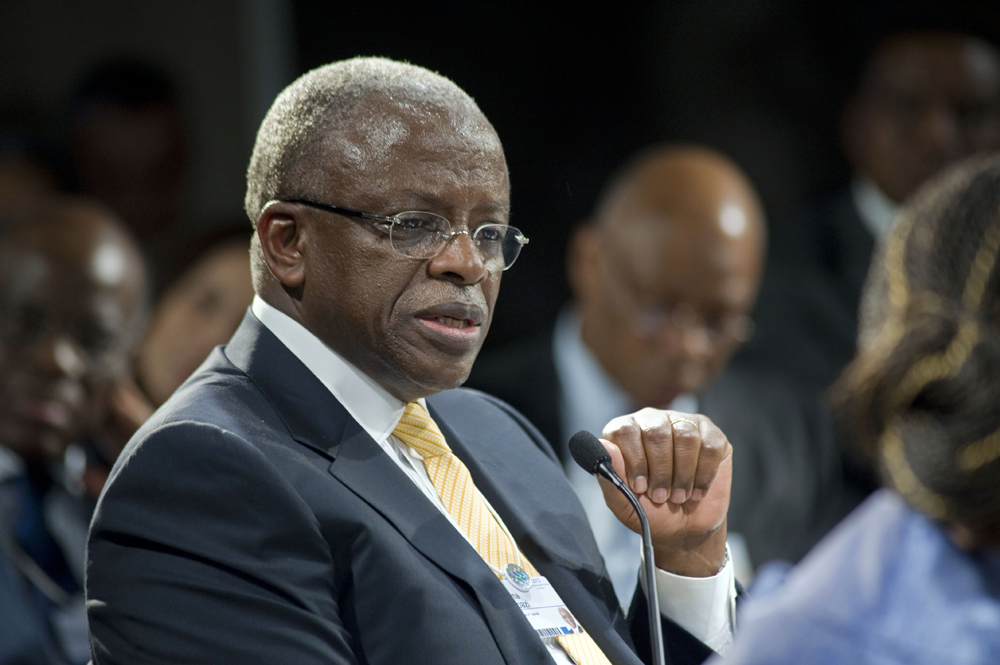 Prime Minister of Uganda Amama Mbabazi gives a speech during the second day of the World Economic Forum Meeting on Africa, at the Cape Town International Convention Centre on May 9, 2013, in Cape Town. AFP PHOTO / RODGER BOSCH (Photo credit should read RODGER BOSCH/AFP/Getty Images)